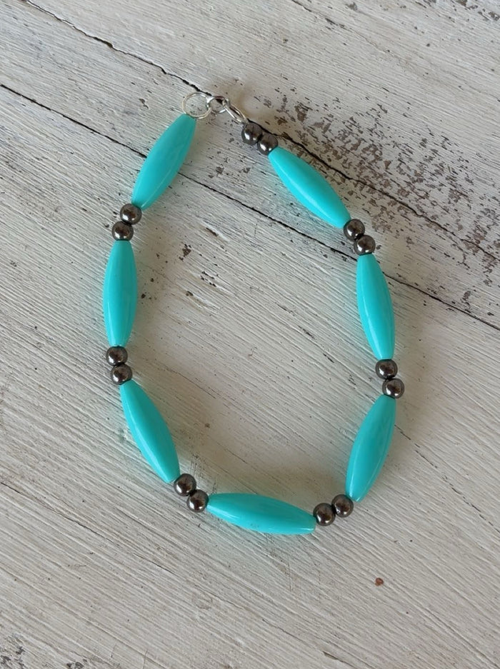 Teal Plastic And Metal Bead Bracelet
