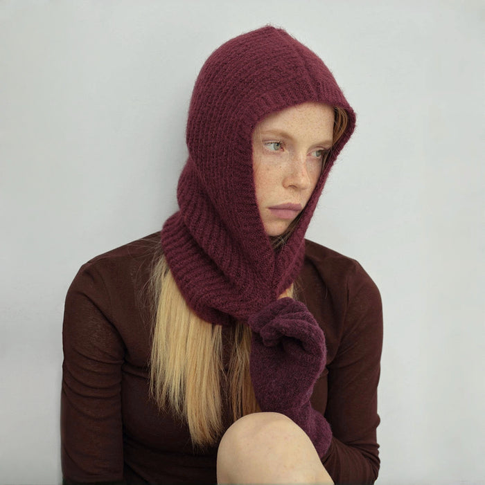Ancora red heavy-knit wool balaclava hat and matching gloves on a model for winter.