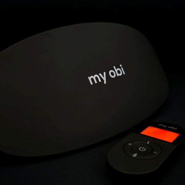 Rechargeable TENS  and heating device for period, and lower back with red light therapy