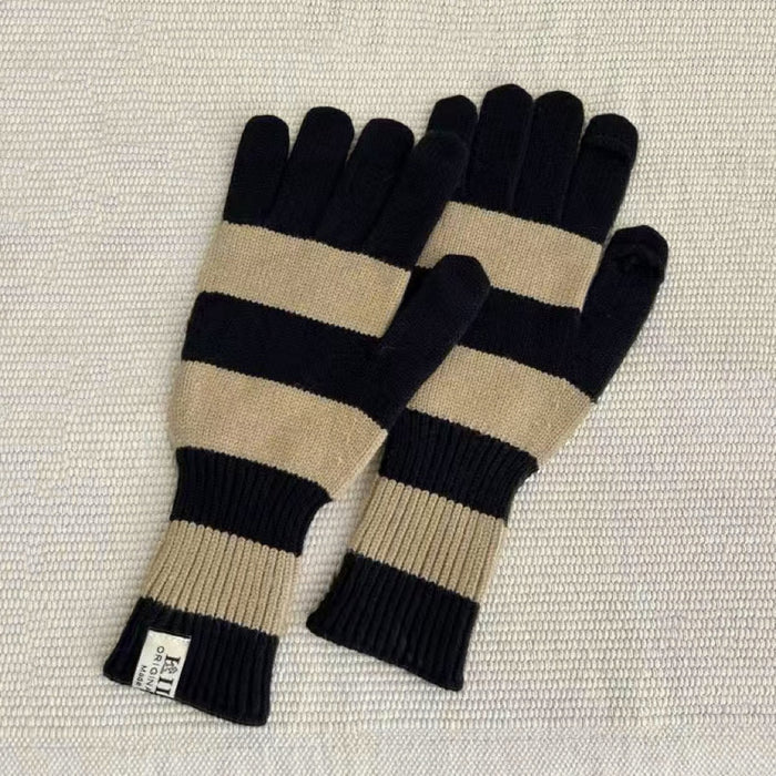 Bold stripe knit gloves in black and khaki with ribbed cuffs; warm accessory for winter commuting.