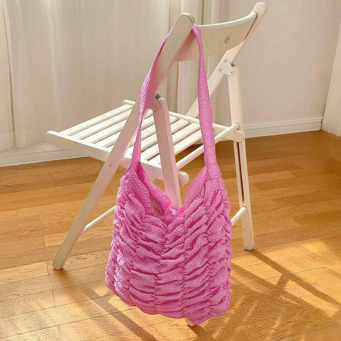 Front view of Pink polyester Bubble Pleat Bag, , with a textured, ruched design and shoulder strap polyester.