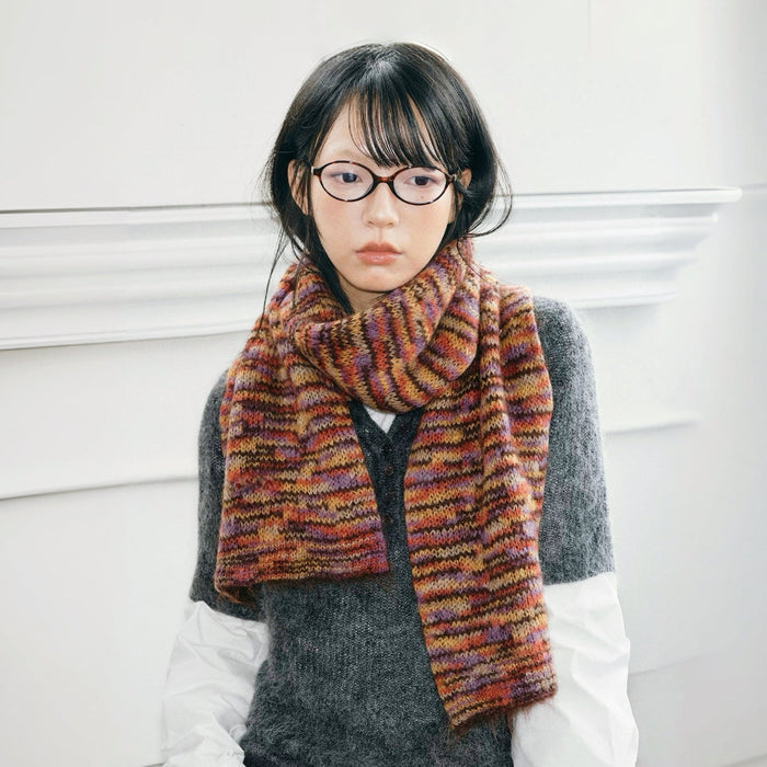 Model wearing wool blend Dual-Sided Aurora Texture Soft Scarf in multi-color stripes, great for office layering.