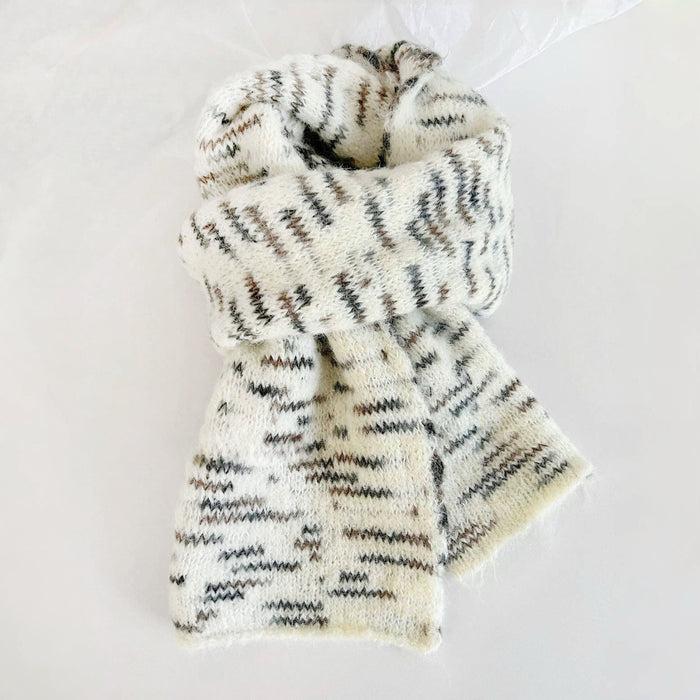 Close-up of Dual-Sided Aurora Texture Soft Scarf in white, great for office layering and commuting.