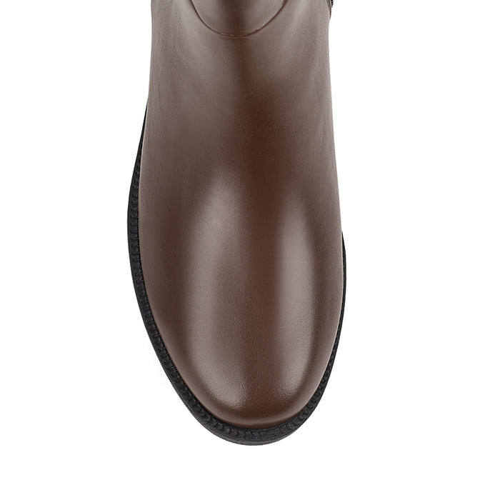Brown knee high boot with a wide calf shaft