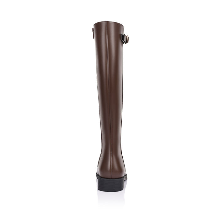 Women's knee high flat riding boots with elastic gusset and gold buckle detail