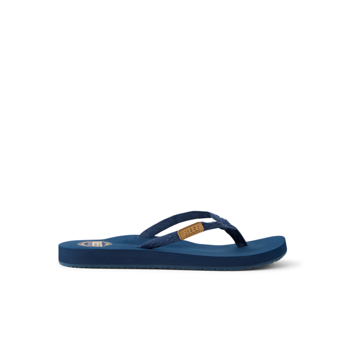 Ginger women's navy blue flip flop sandal facing left with anatomical arch support and soft-rebound cushioning by REEF