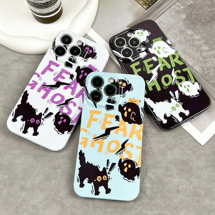 FEAR GHOST text and minimalist cat designs on silicone cases. Whimsical Halloween aesthetic.