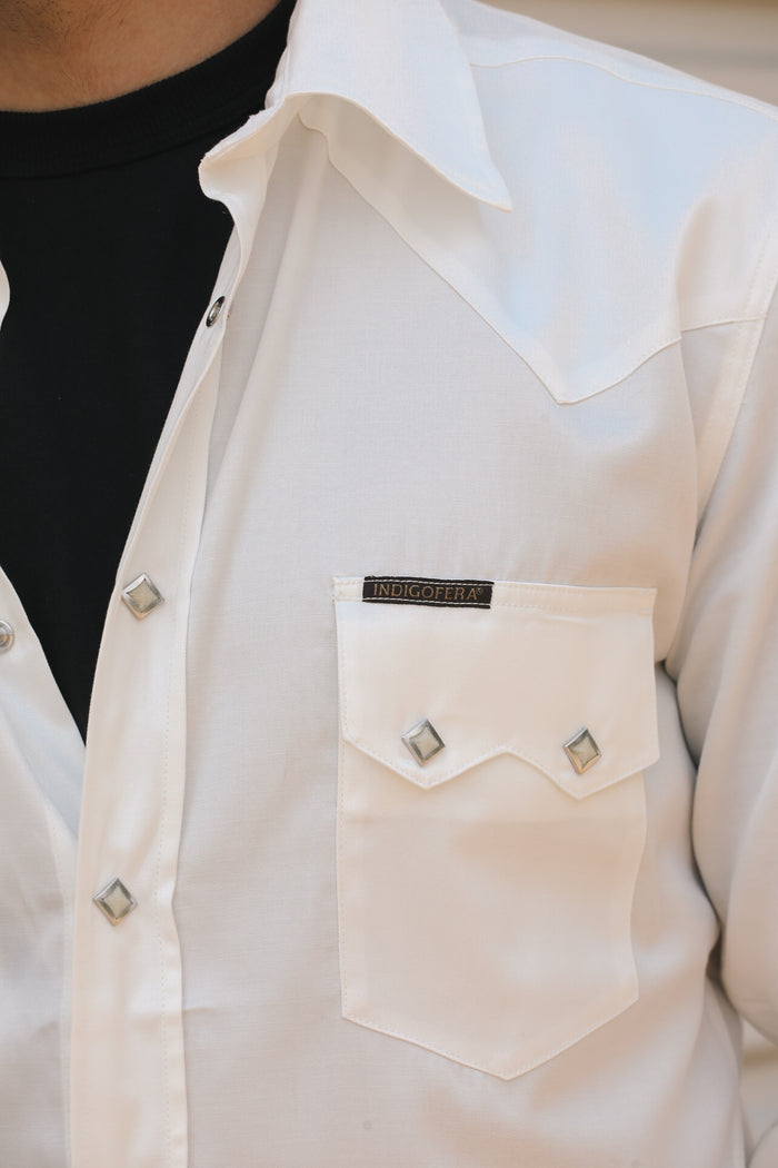 Close-up of white Lindell Tencel Cotton western shirt with metal snap buttons and chest pocket label