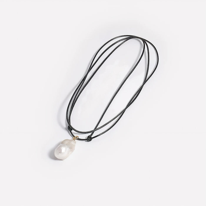 Close up of silver drop necklace showing adjustable extension chain and lobster clasp