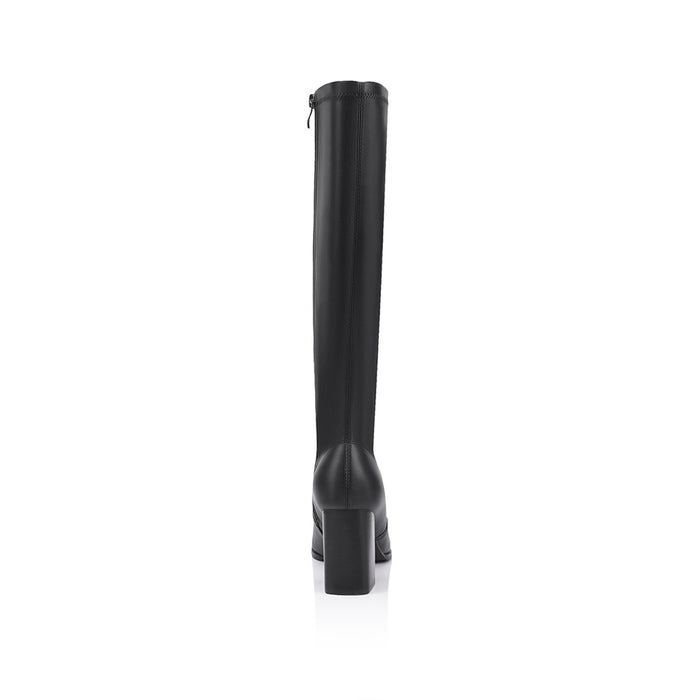 Black knee-high boot on a mid block heel