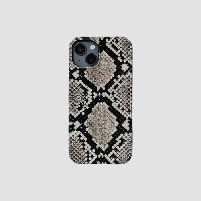 Silicone iPhone case with a realistic black and white python skin design. Edgy streetwear style.