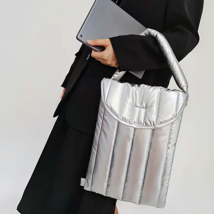 Model carrying a silver polyester bag in hand, ideal for city walks and gifting.