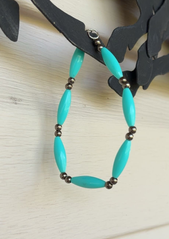 Teal Plastic And Metal Bead Bracelet