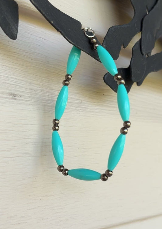 Teal Plastic And Metal Bead Bracelet