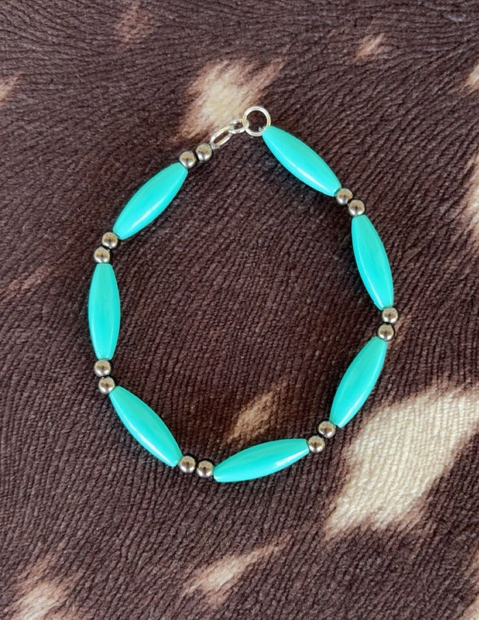 Teal Plastic And Metal Bead Bracelet