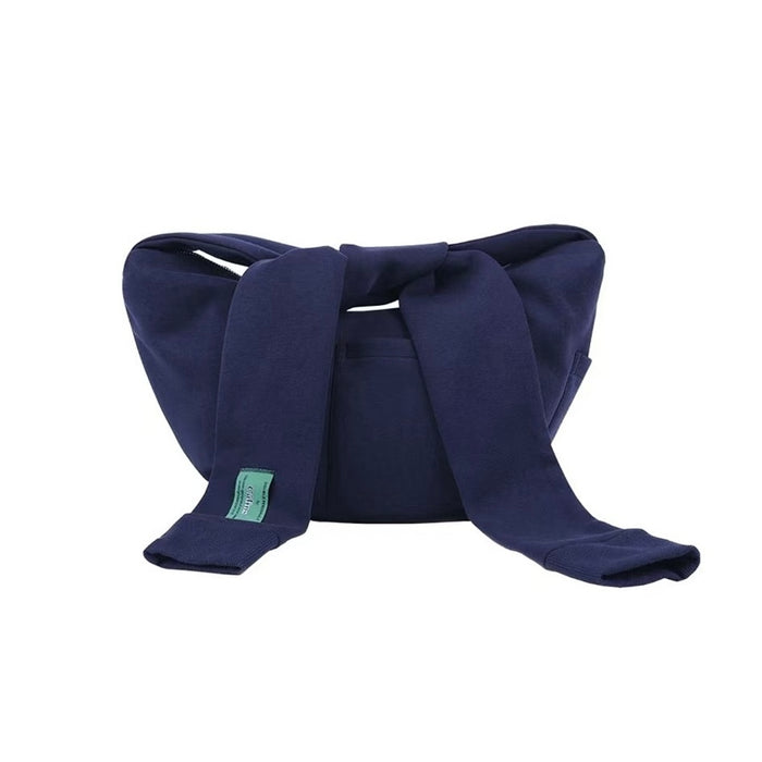 Close-up of Twist & Tie Sleeve Bag in blue, great for everyday carry and travel.